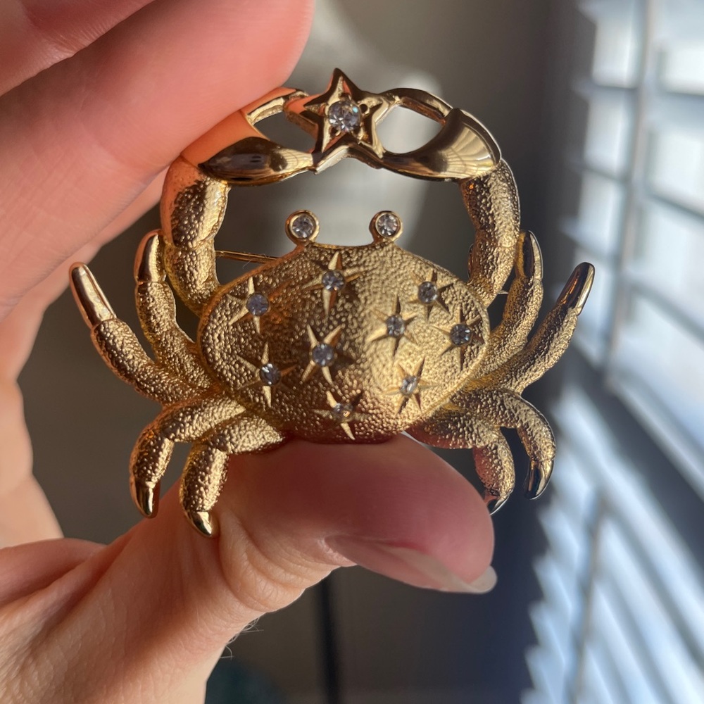 Gold Crab Brooch with Star Accents